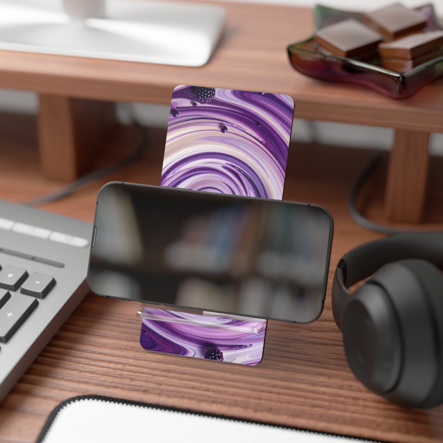 Vibrant Swirl Phone Stand - Eye-catching, functional mobile display holder ideal for hands-free use