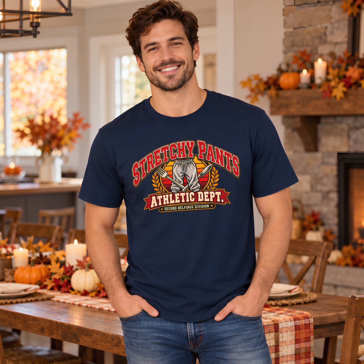 Man wearing the Navy Stretchy Pants Athletic Dept. tee at a holiday dinner table